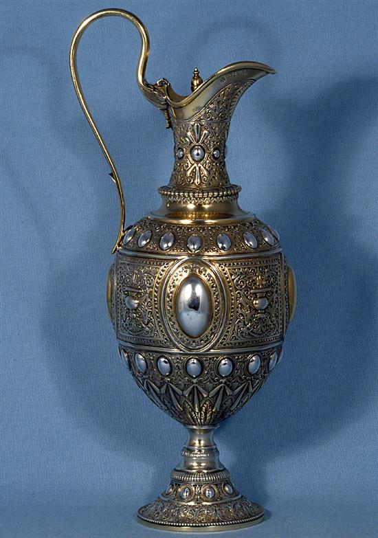 A mid Victorian parcel gilt silver ovoid shaped wine ewer/ claret jug, Height 13 ½”/340mm Weight 23.oz/653grms